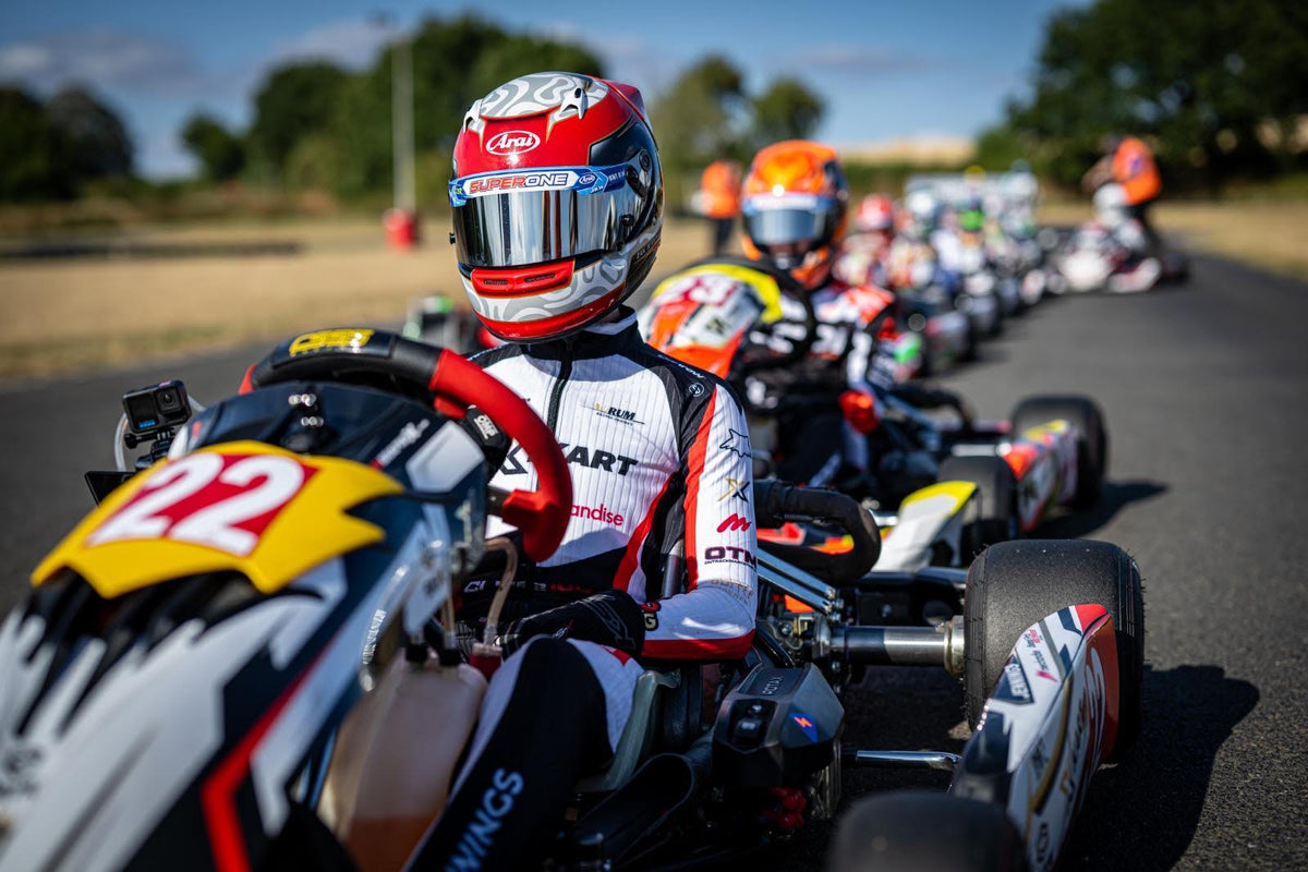 Karting grid at Whilton Mill. Driver wearing a Danrow AeroSuit